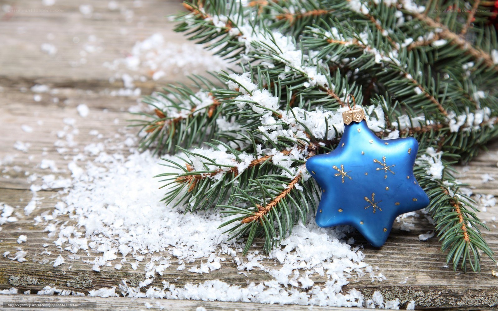 Blue star ornament on snow