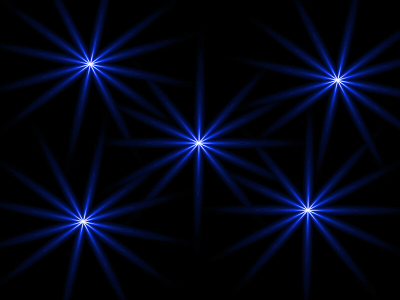 Blue starburst lights on black