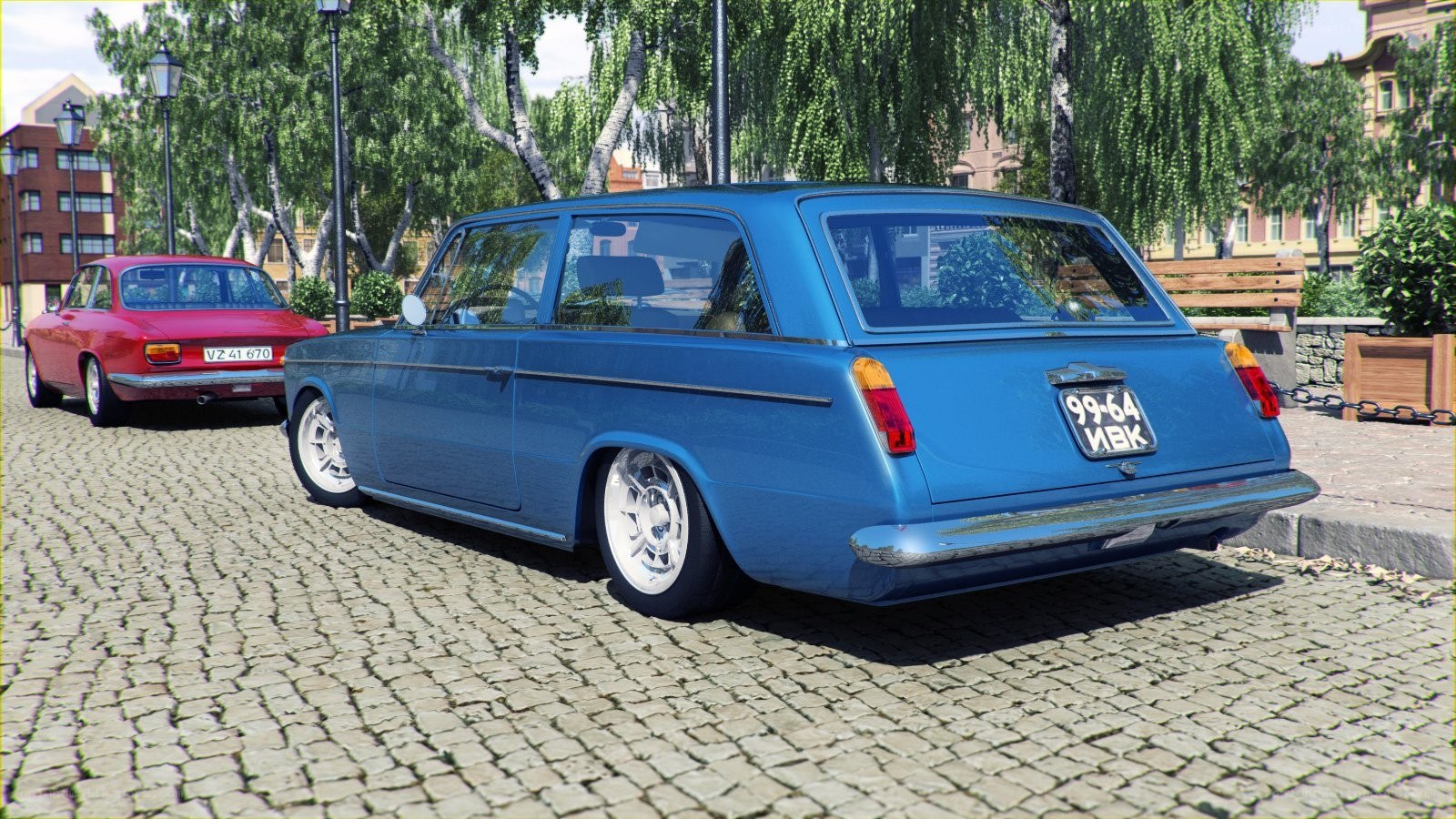 Blue station wagon on cobblestones