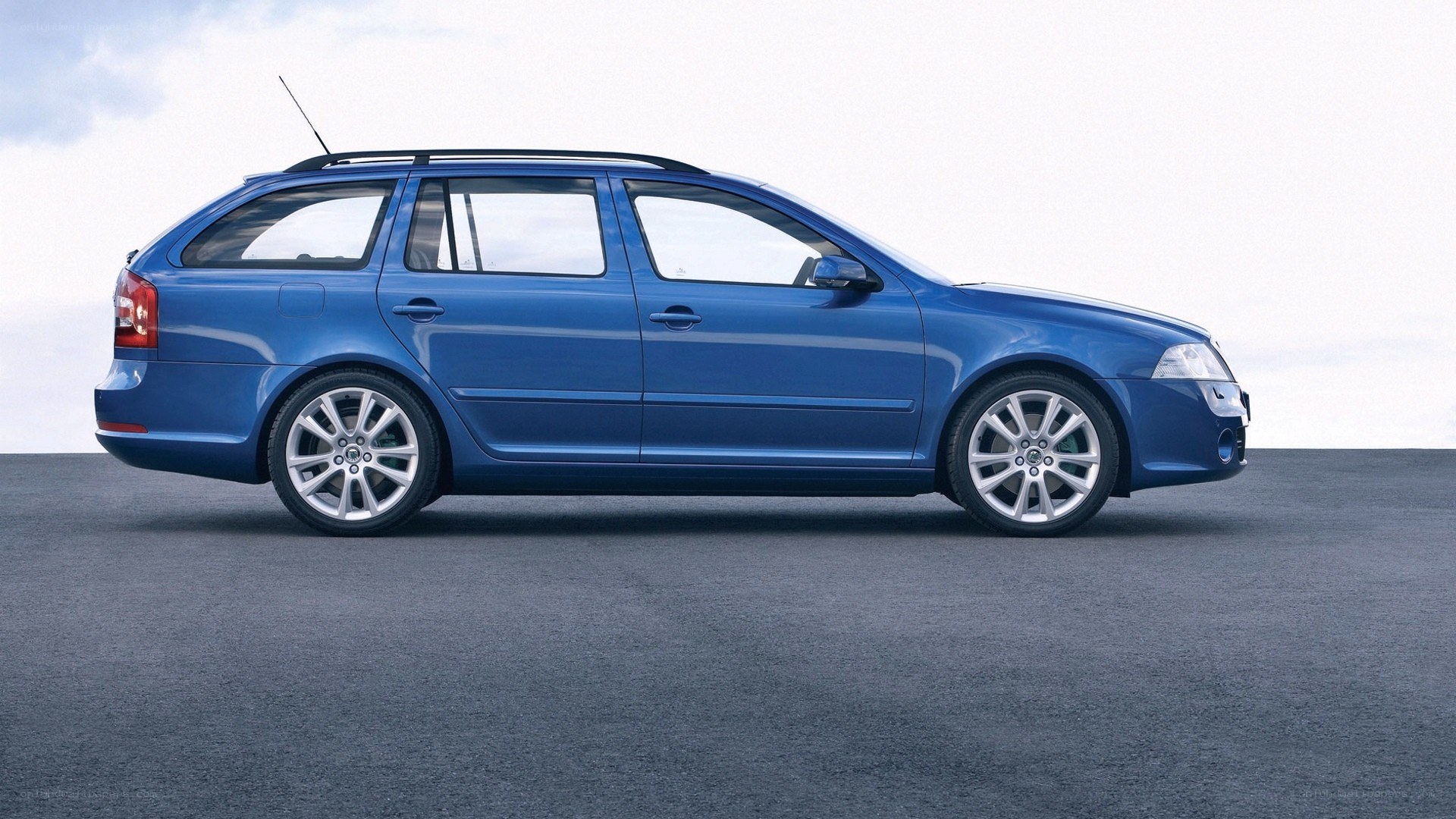 blue station wagon side view