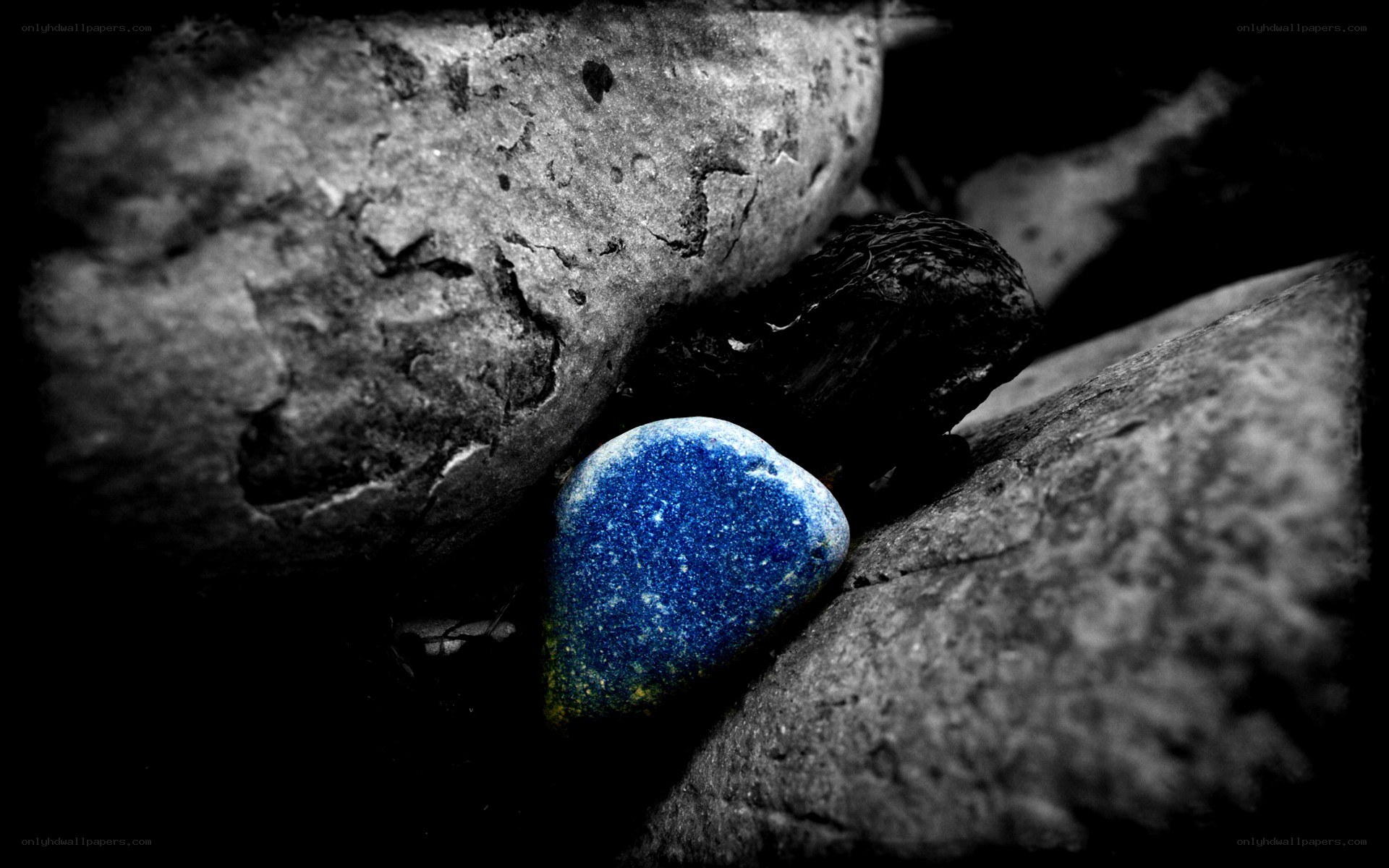 blue stone among rocks