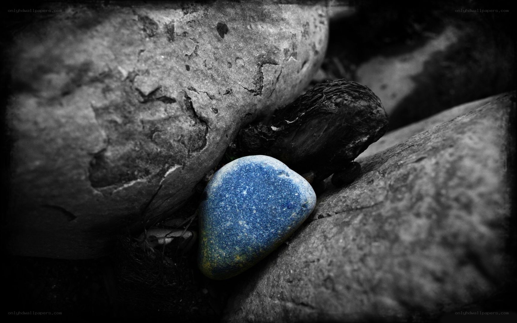 blue stone among rocks