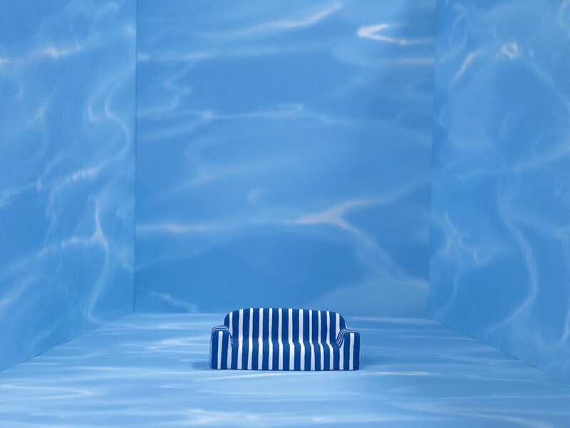 blue striped couch underwater