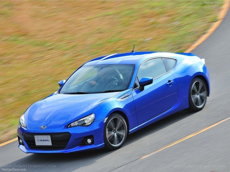 blue subaru brz in motion