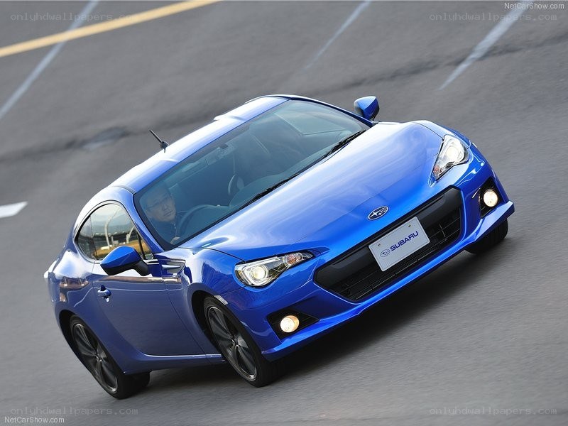 blue subaru brz in motion
