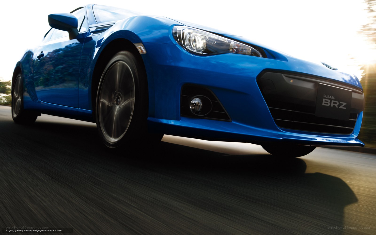 Blue Subaru BRZ in motion
