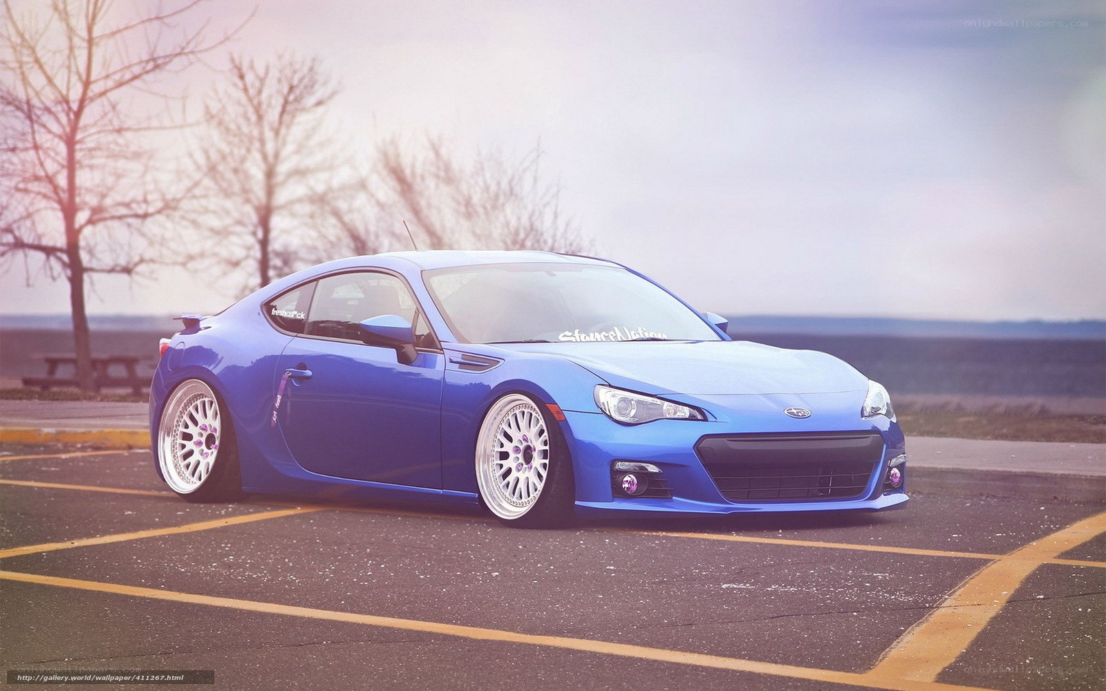 Blue Subaru BRZ in parking lot