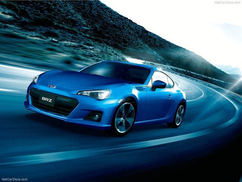 Blue Subaru BRZ on a winding road