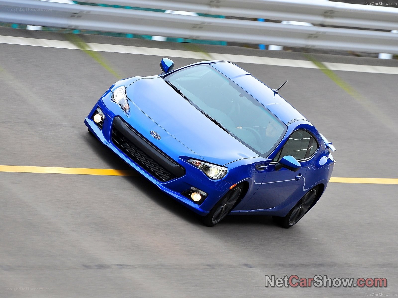 blue subaru brz on track