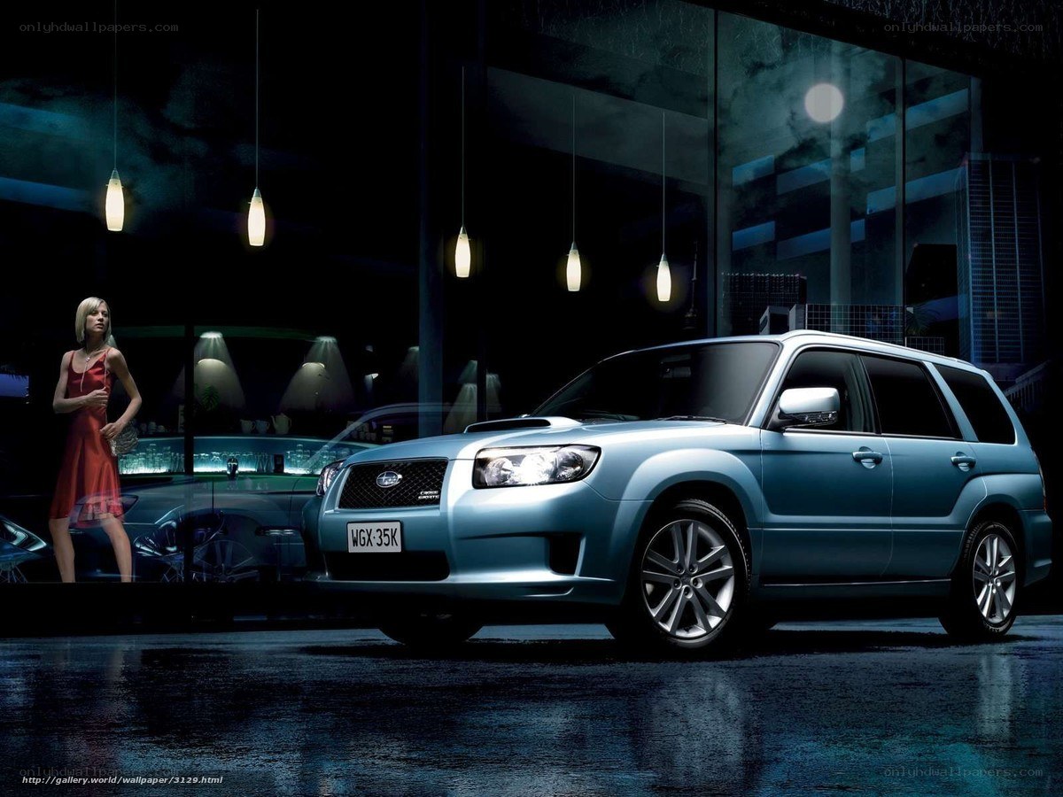 Blue Subaru Forester at night