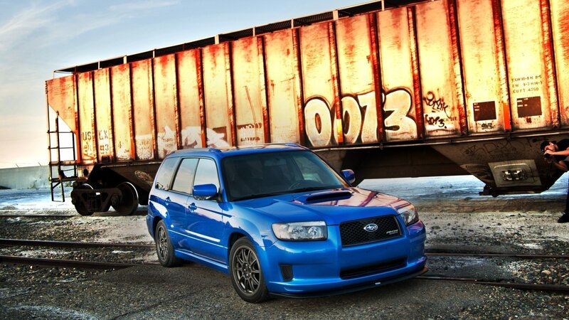 Blue Subaru Forester — Dramatic, Sunset