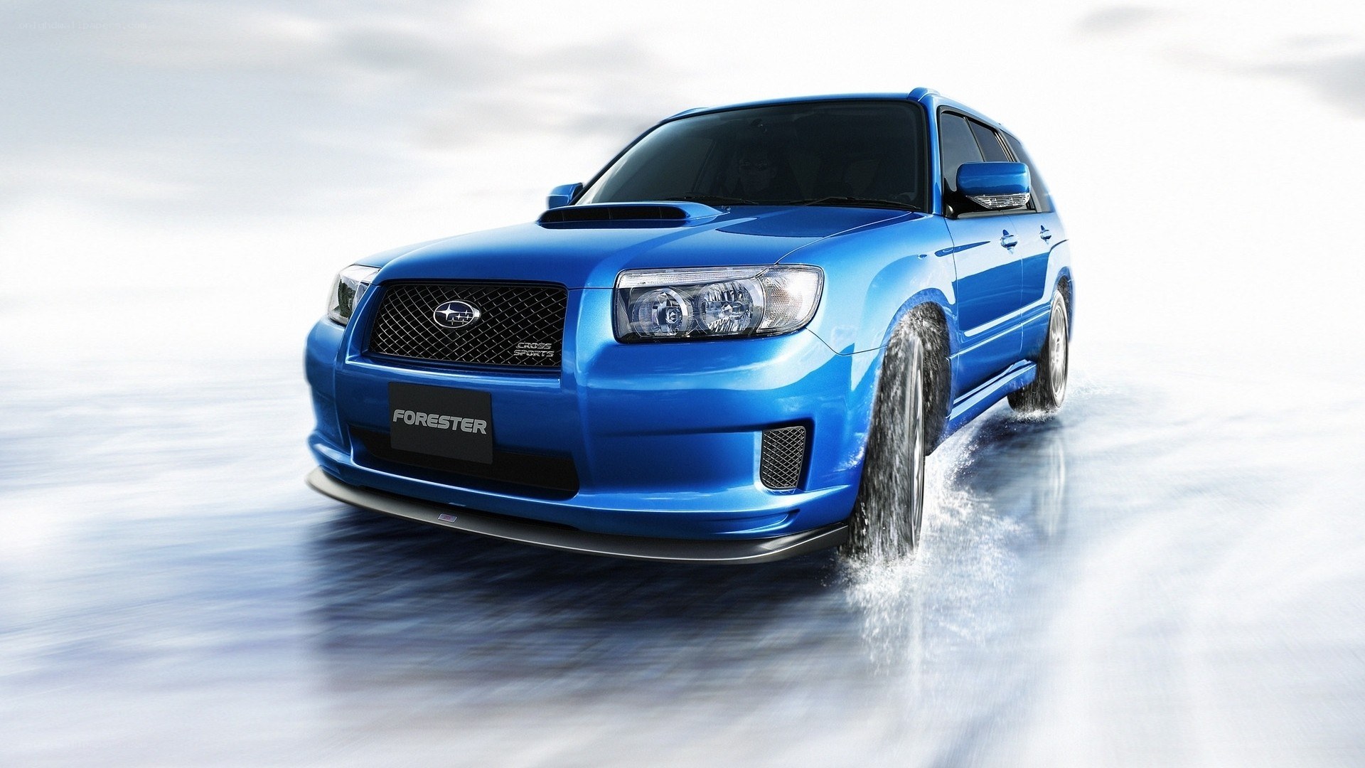 Blue Subaru Forester in motion
