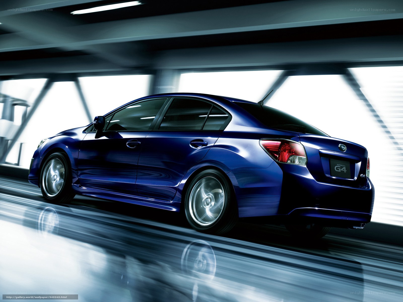 Blue Subaru G4 in motion