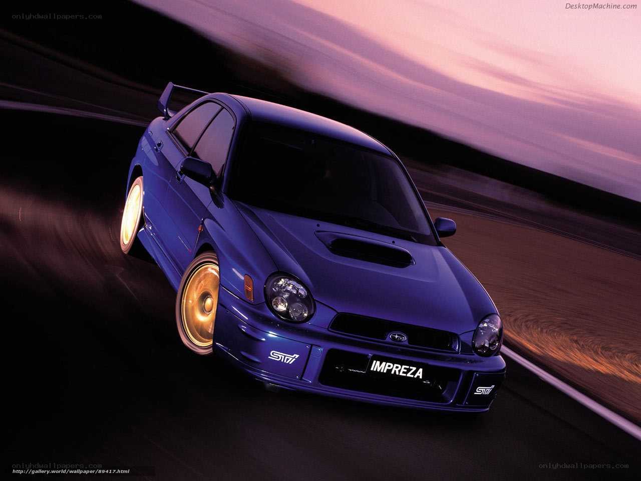 Blue Subaru Impreza in motion