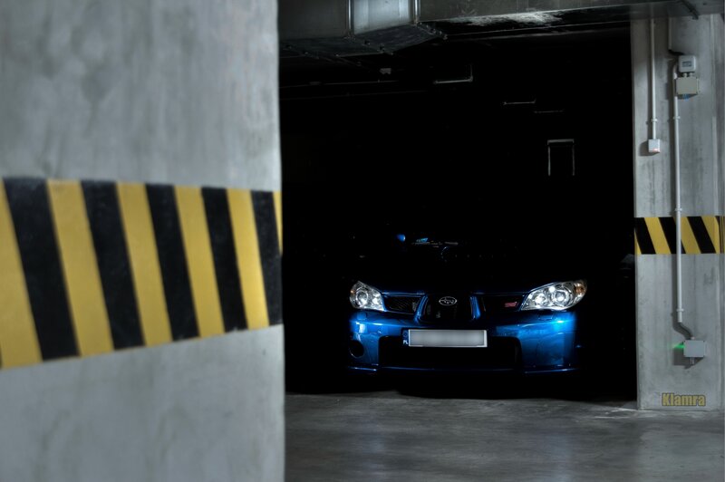 Blue Subaru in Garage