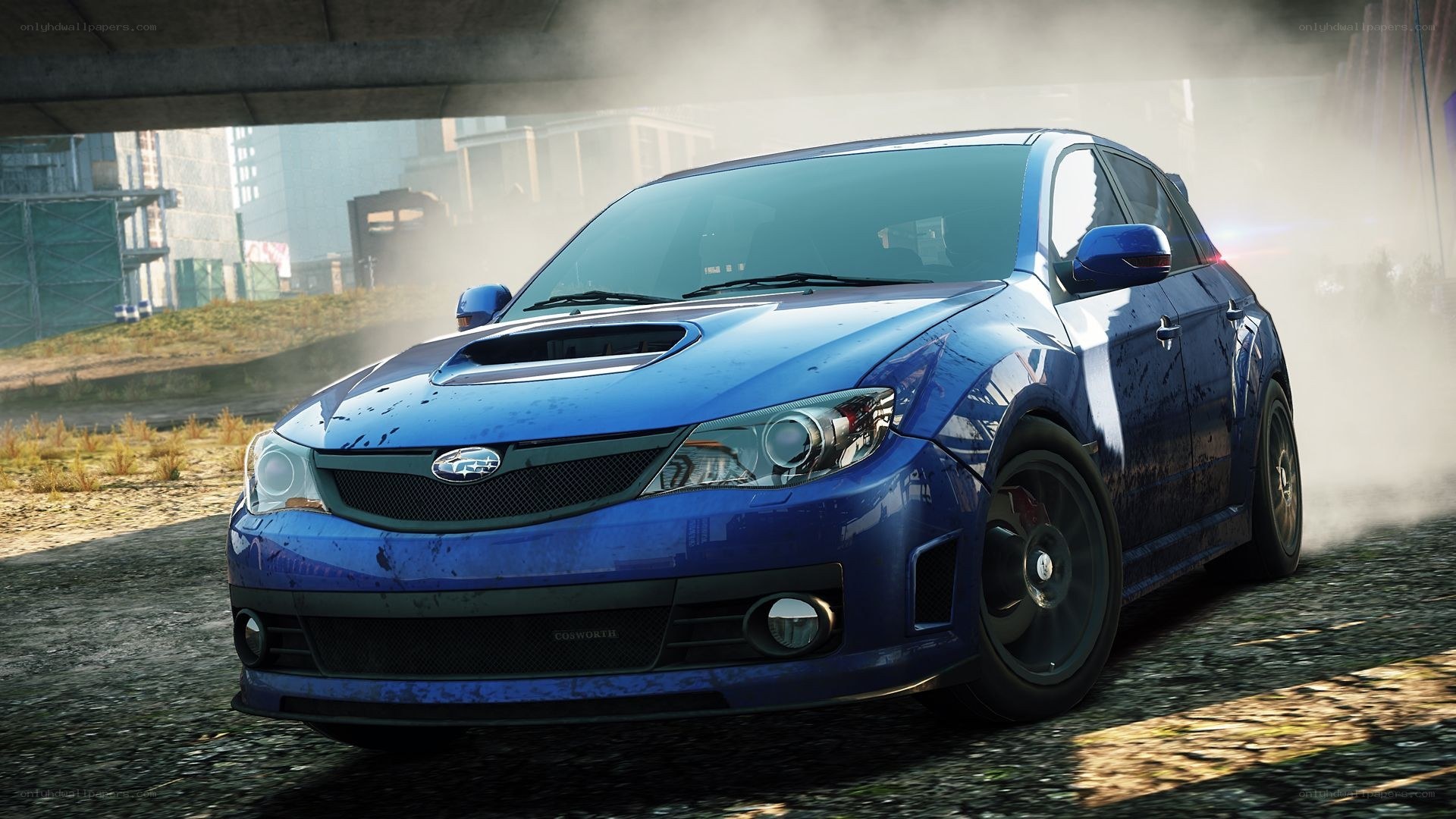 blue subaru in urban setting