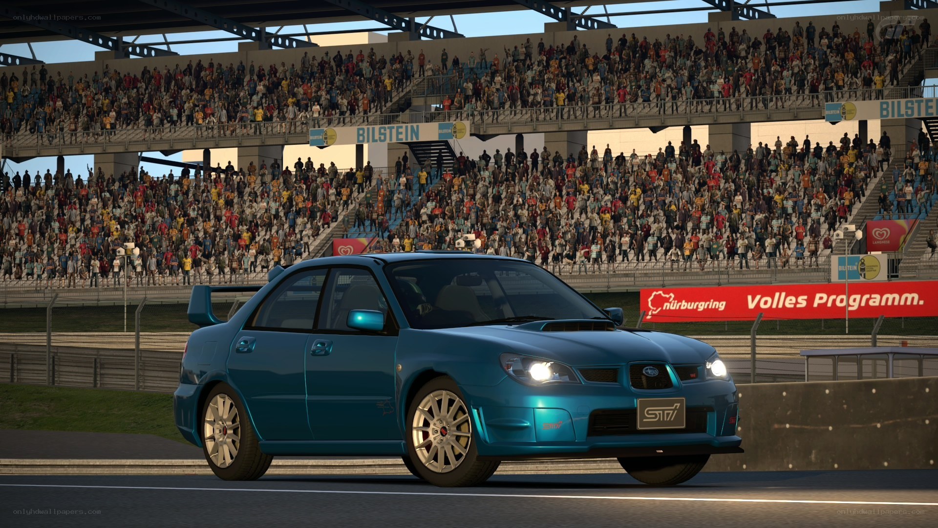 Blue Subaru on a racetrack