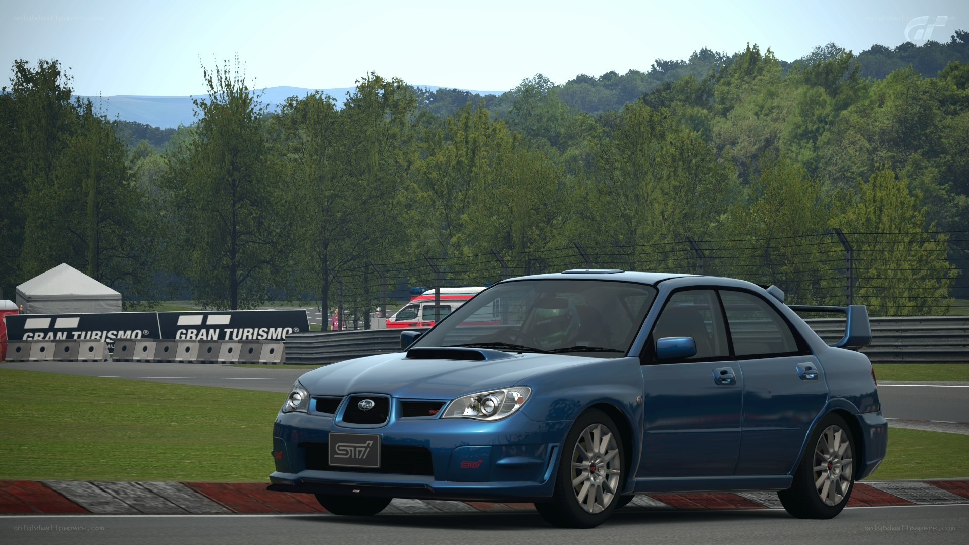 blue subaru on racetrack