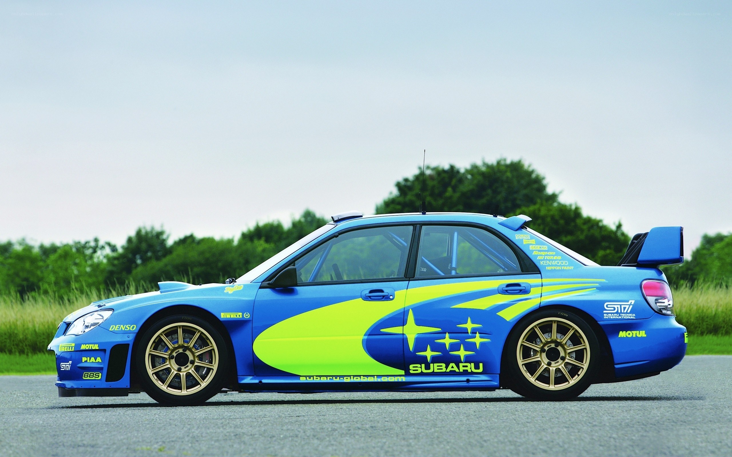 blue subaru rally car
