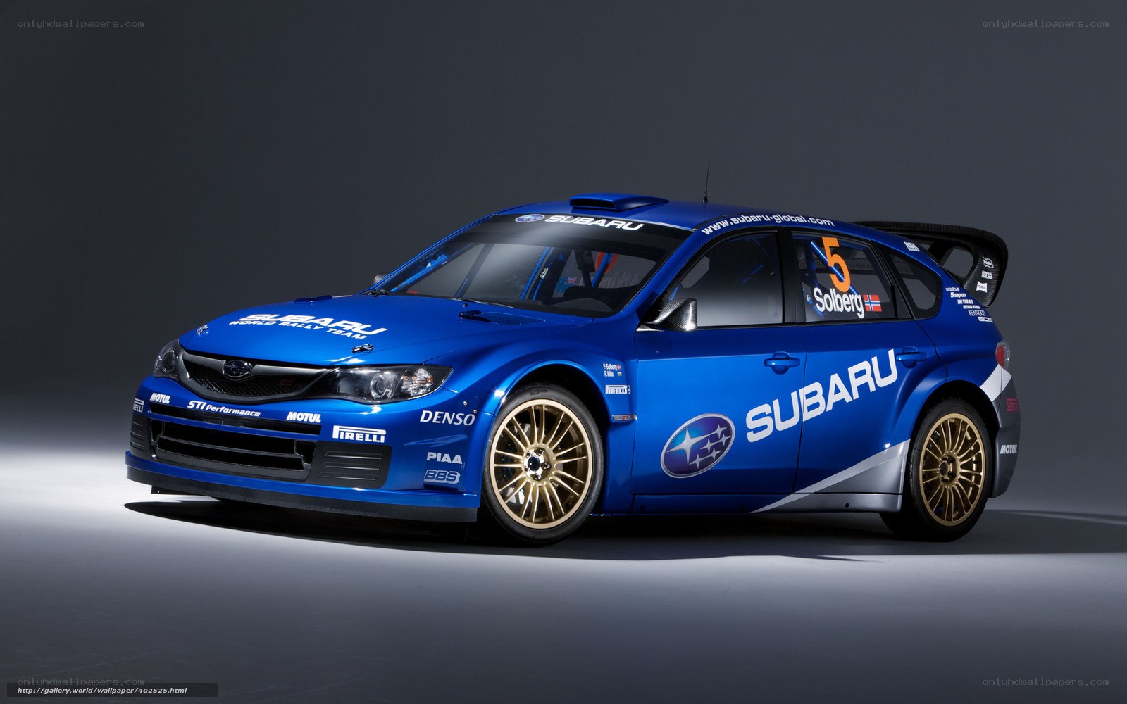 blue subaru rally car