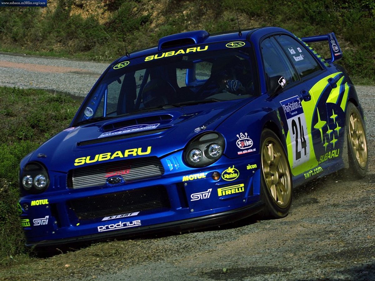 blue subaru rally car