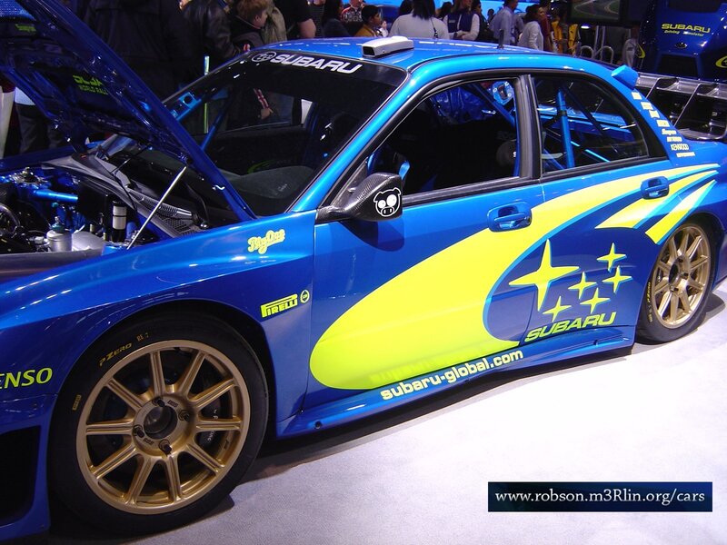 blue subaru rally car