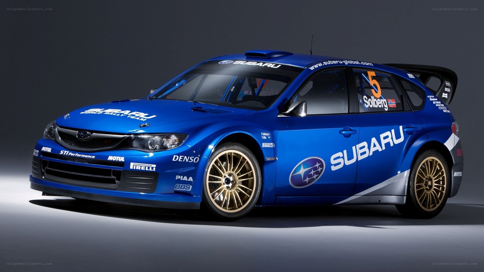 blue subaru rally car