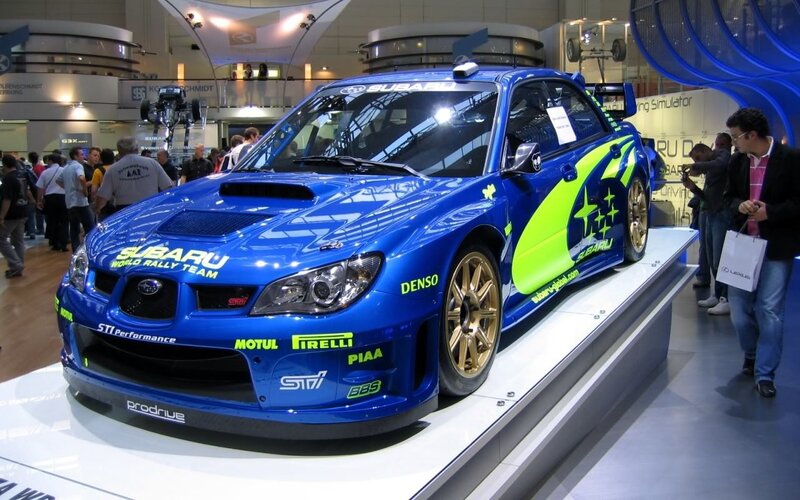 Blue Subaru rally car on display