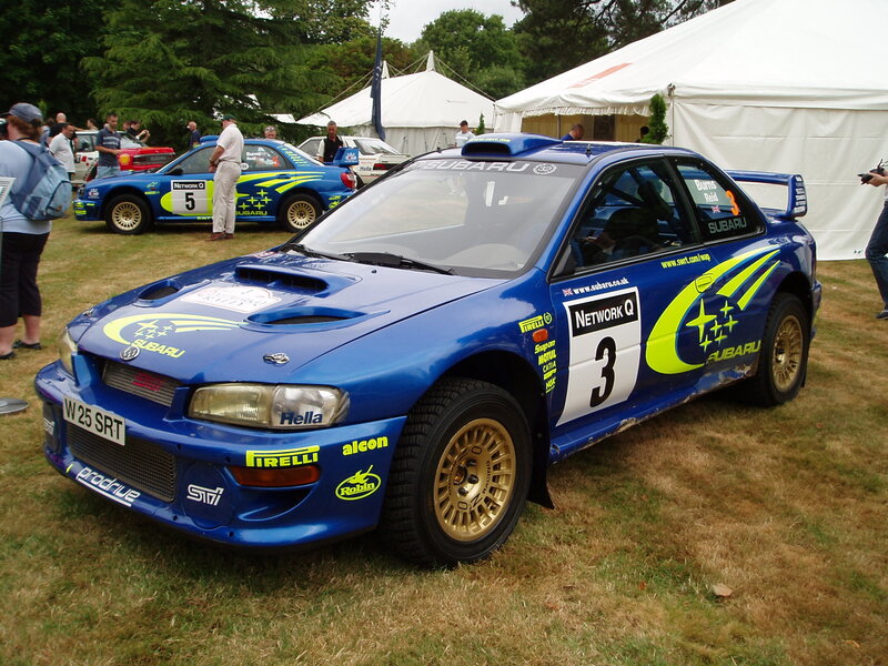 Blue Subaru rally car on display