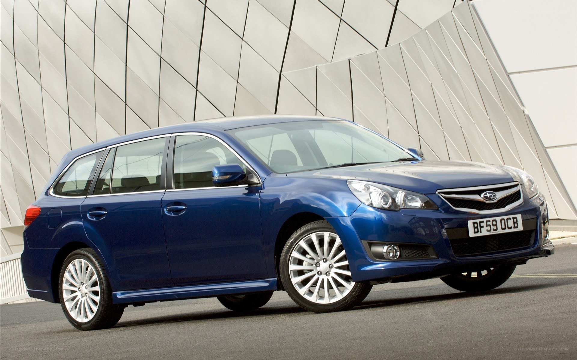 blue subaru station wagon