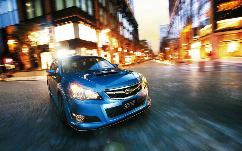 Blue Subaru STI in city