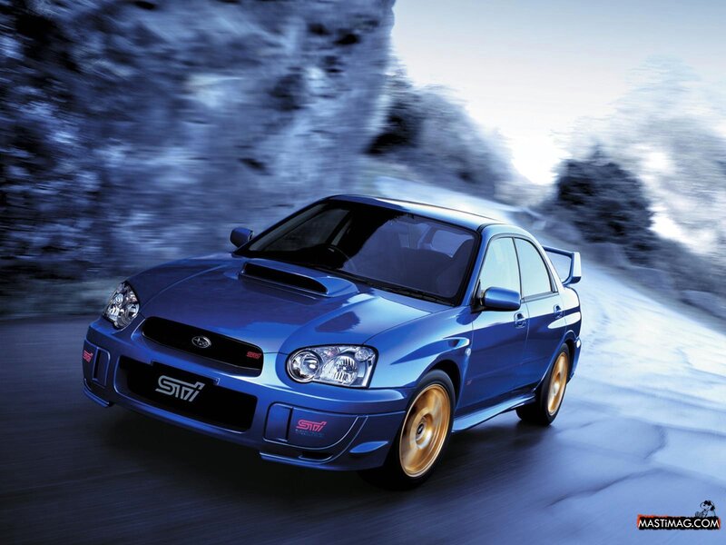 blue subaru sti in motion