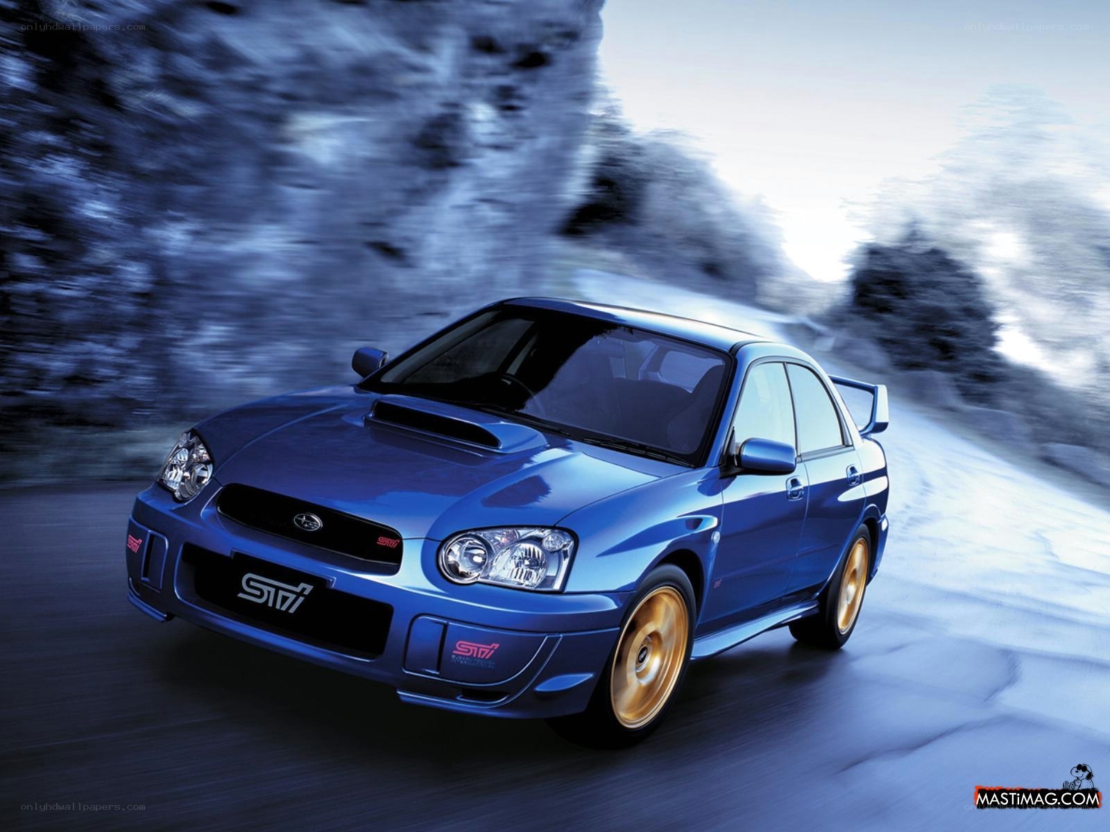 blue subaru sti in motion