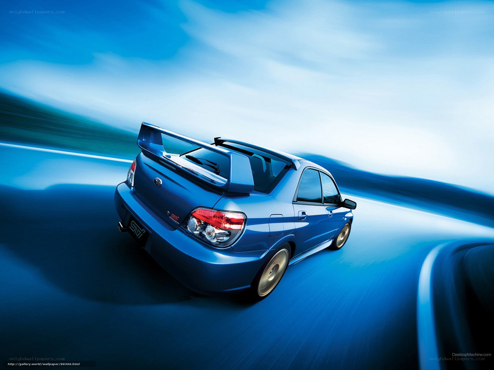 blue subaru sti in motion