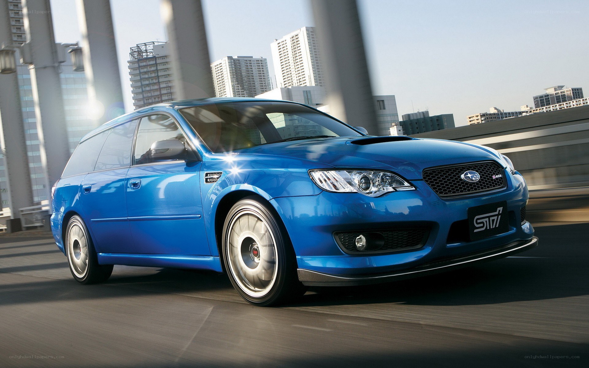 Blue Subaru STI station wagon