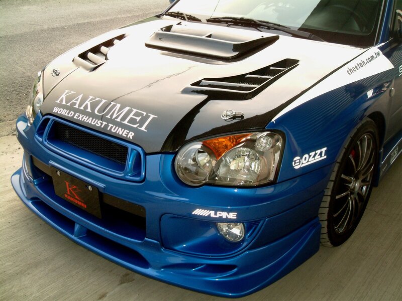 Blue Subaru with aftermarket parts