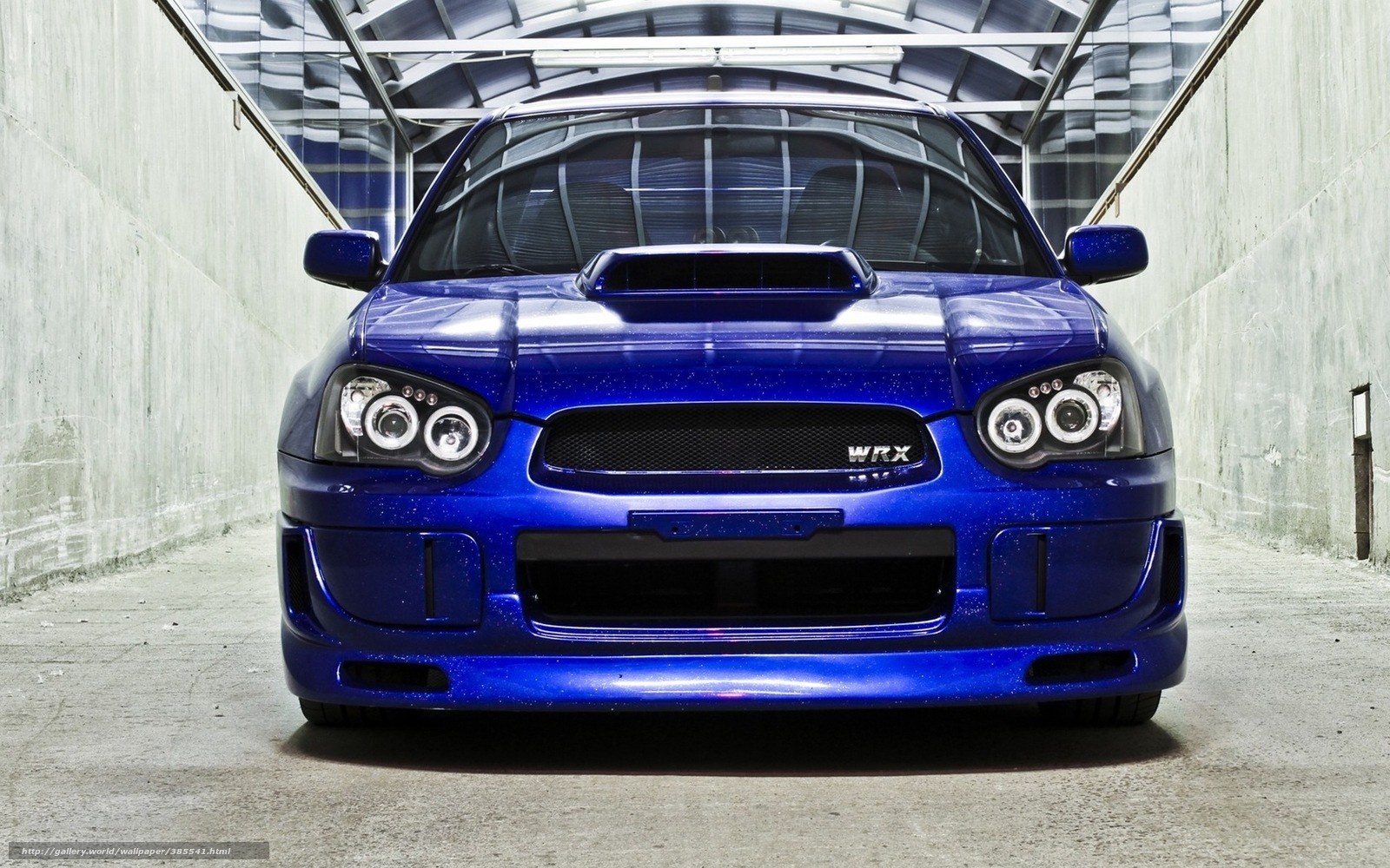 Blue Subaru WRX in tunnel