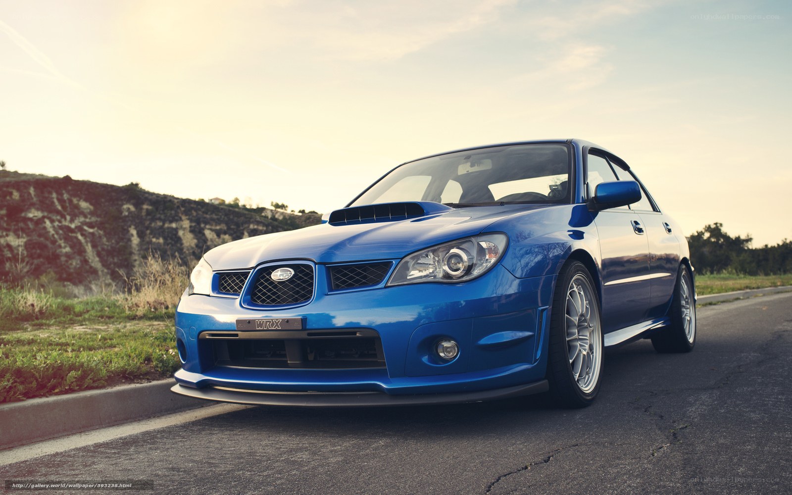 blue subaru wrx on road
