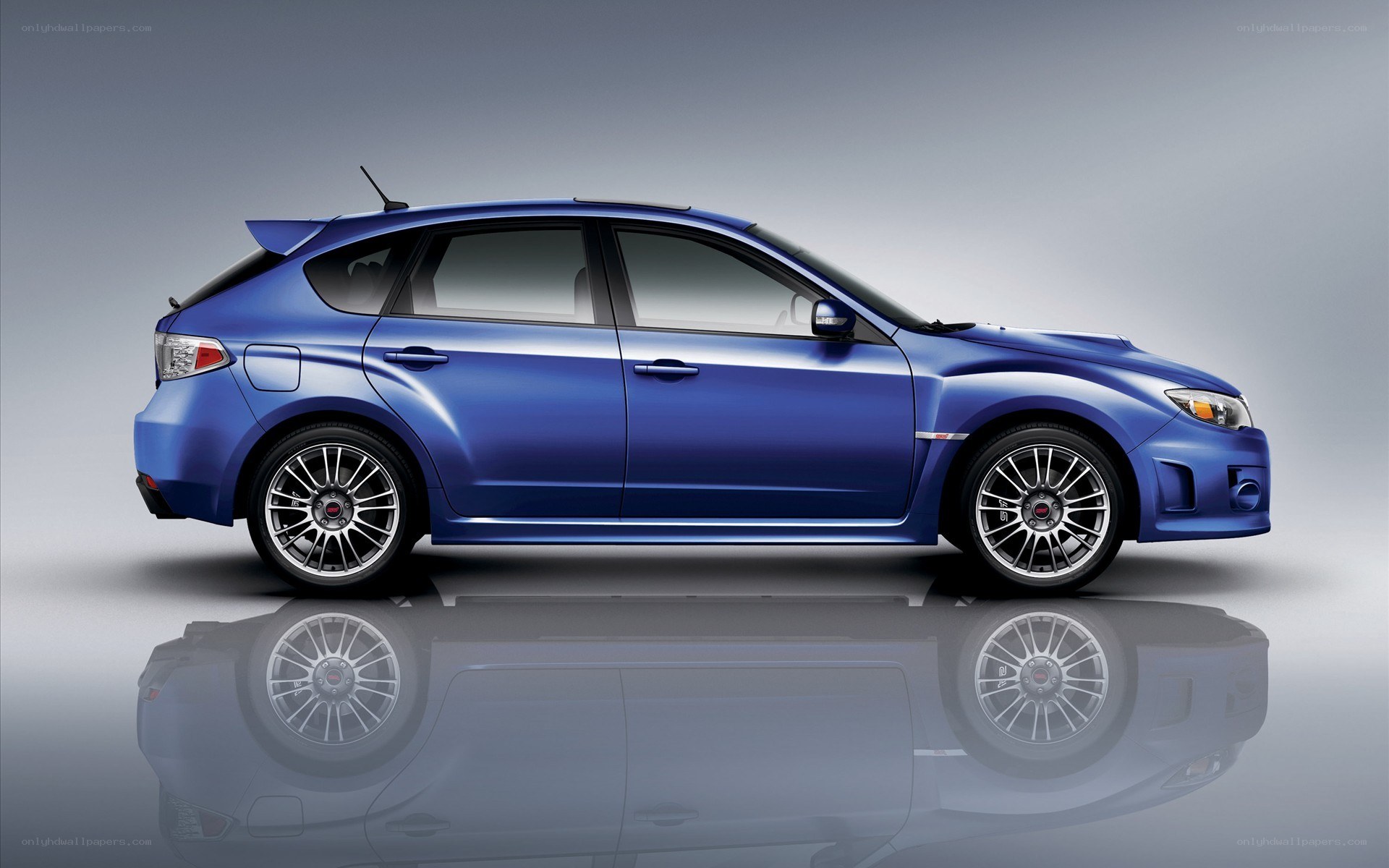 blue subaru wrx sti hatchback