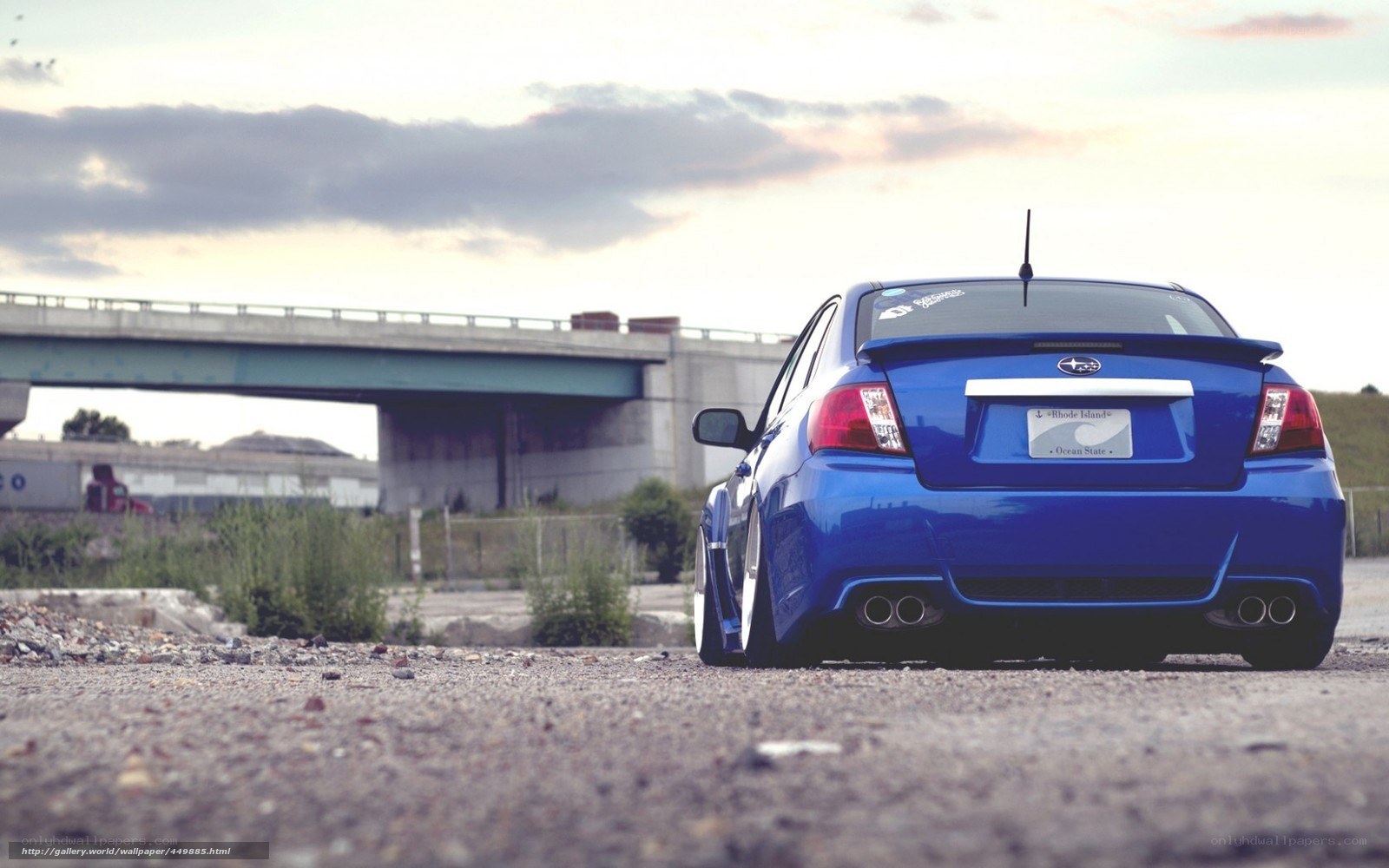 blue subaru wrx sti on gravel