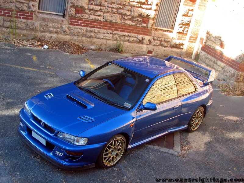 Blue Subaru WRX STI parked