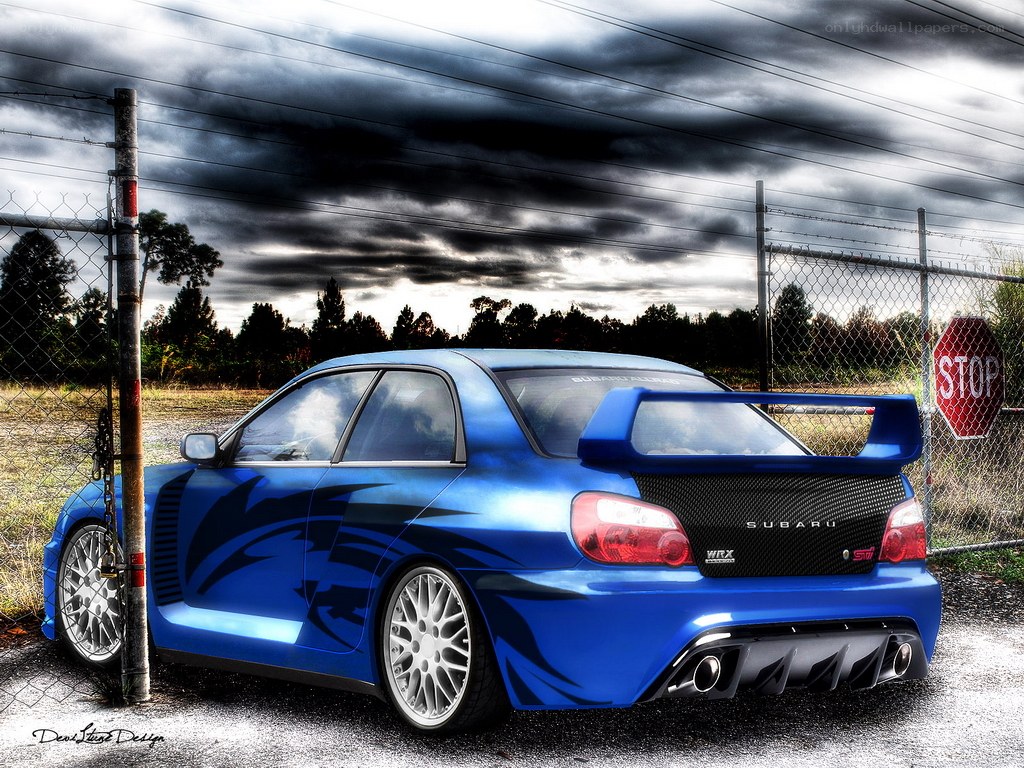 Blue Subaru WRX with custom graphics