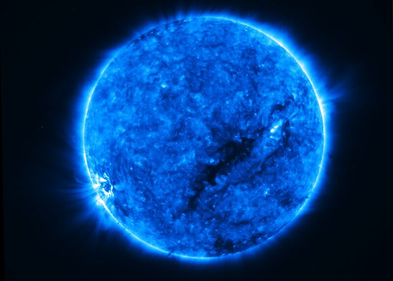 Blue sun with solar flares