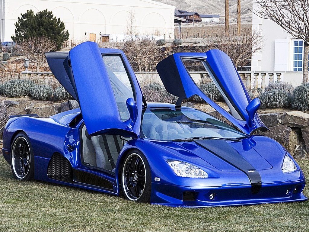 blue supercar with open doors