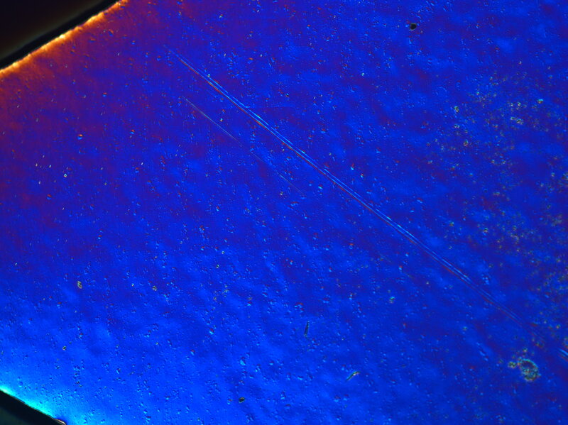 blue surface with scratches