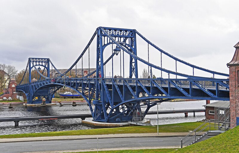 blue suspension bridge over river