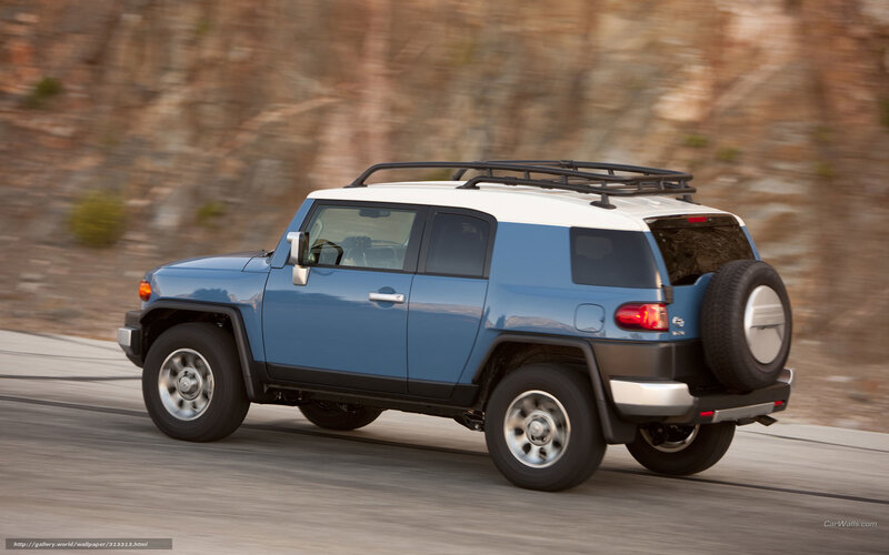 blue suv driving on road