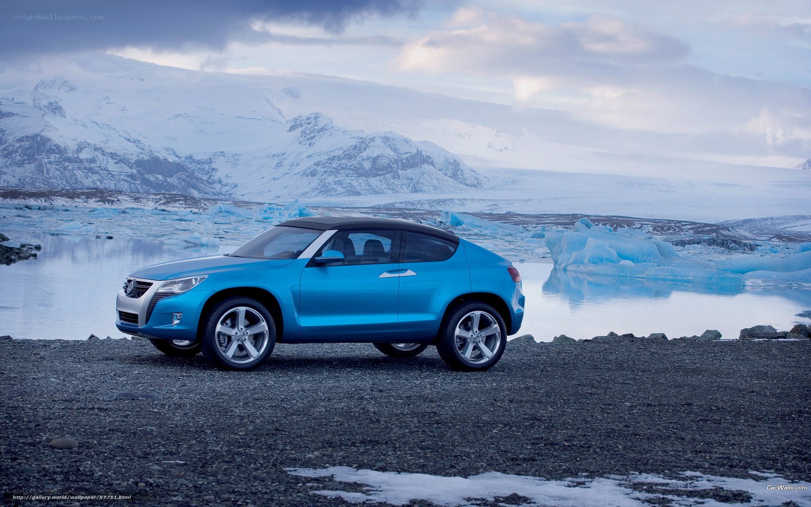 Blue SUV in icy landscape