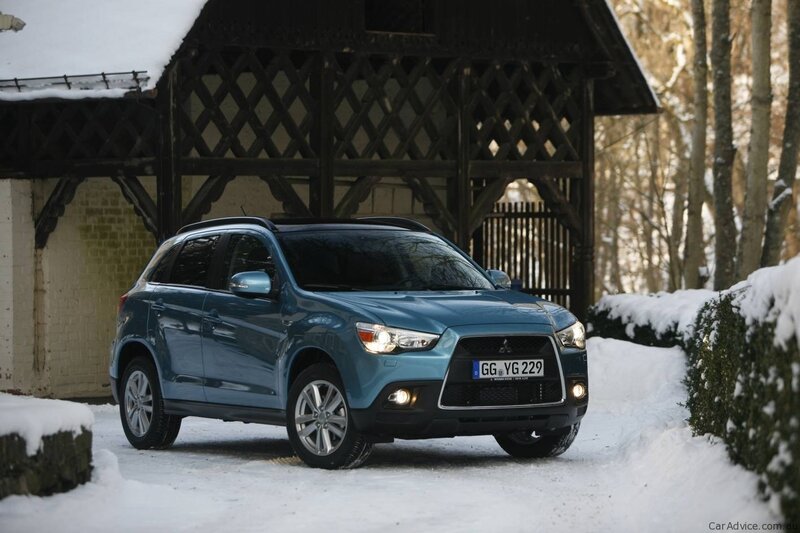 Blue SUV in snowy setting