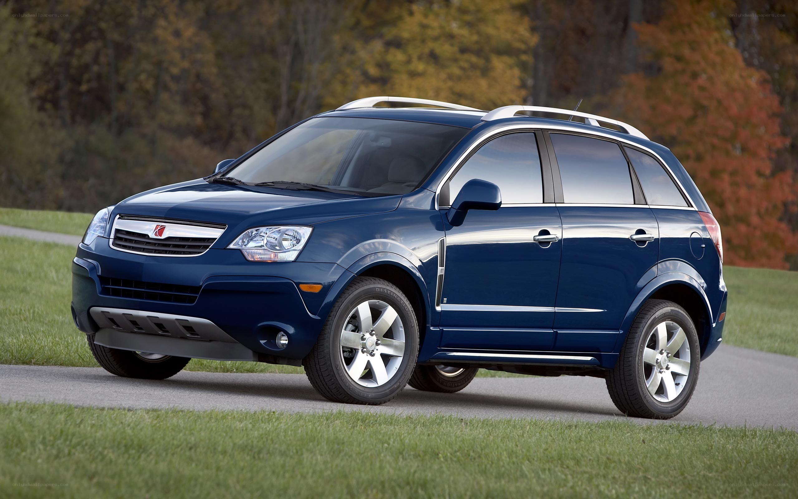 blue suv on a road